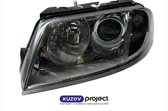 Фара левая под электрокорректор Volkswagen Passat (B5+) 2000-2005 (TYC / Тайвань)